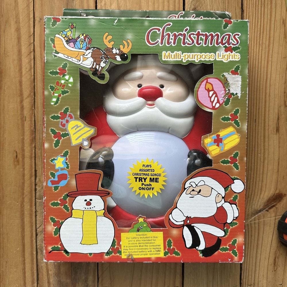 Vintage 2001 Christmas Santa Claus Light That Plays Christmas Songs - Picture 1 of 10